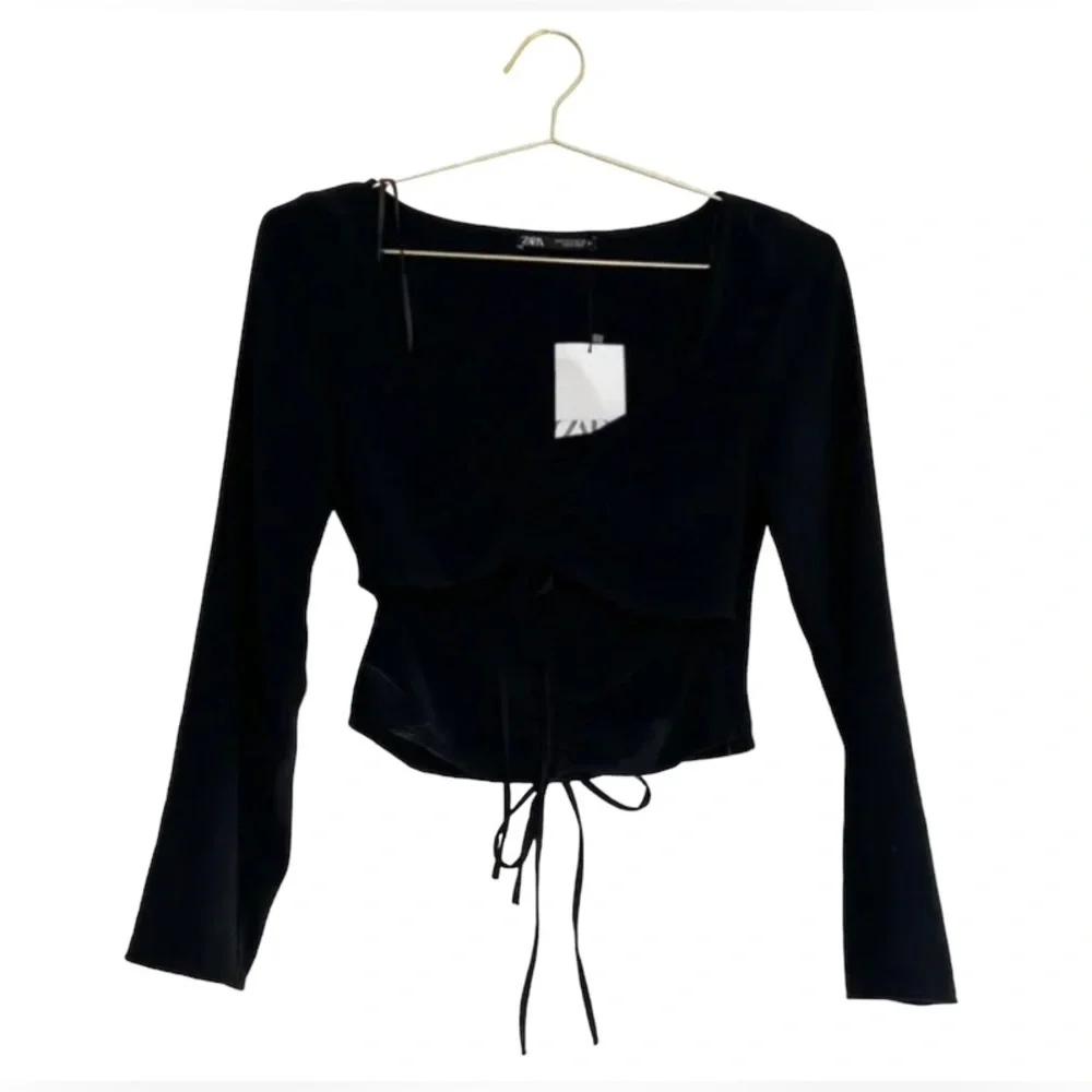 Zara Ruched Cut Out Long Sleeve Top in Black